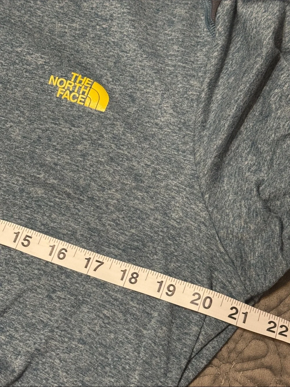 The North Face Men's Heathered Blue V‑Neck Performance Tee dark blue Accents